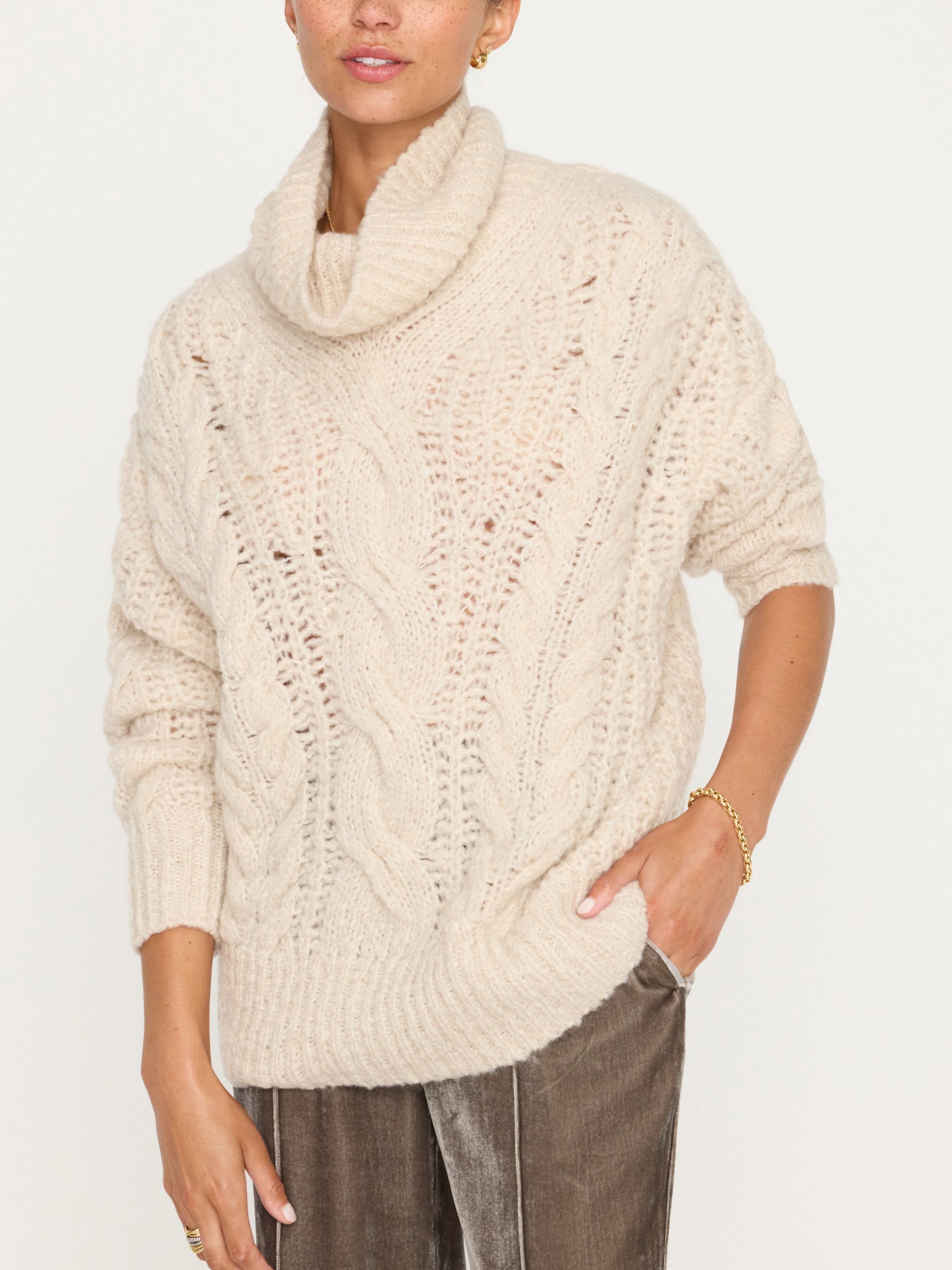Elden cable knit beige turtleneck sweater front view 2