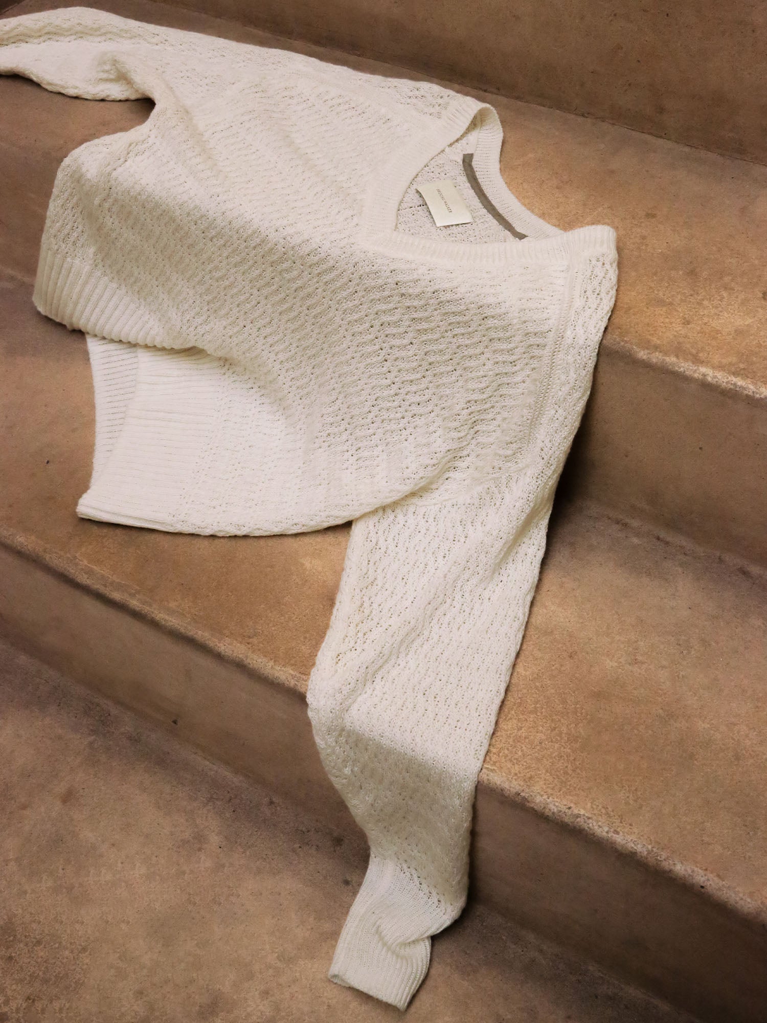 Leia open stitch V-neck white sweater flat view