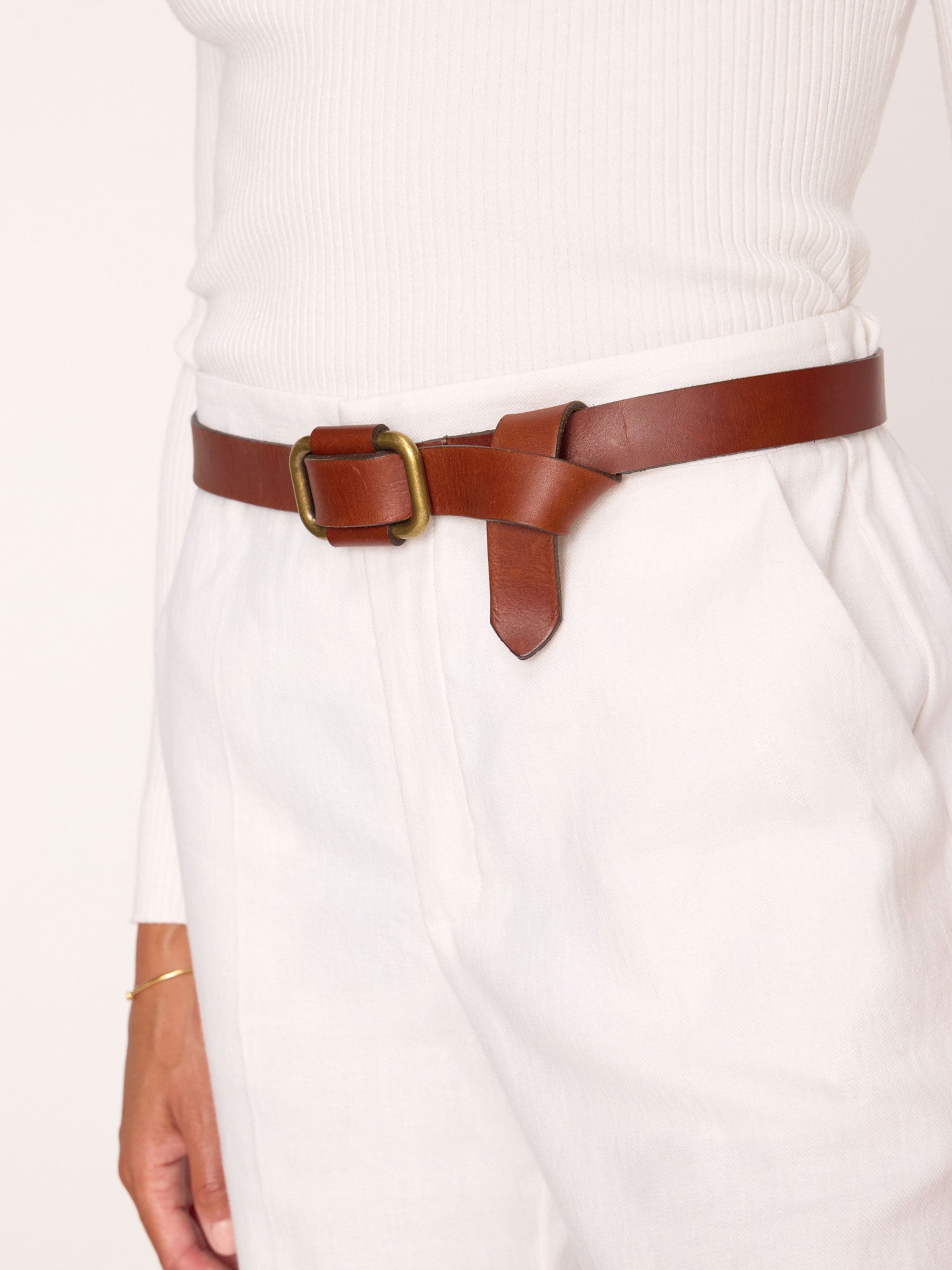 Saddle brown leather buckle belt side view