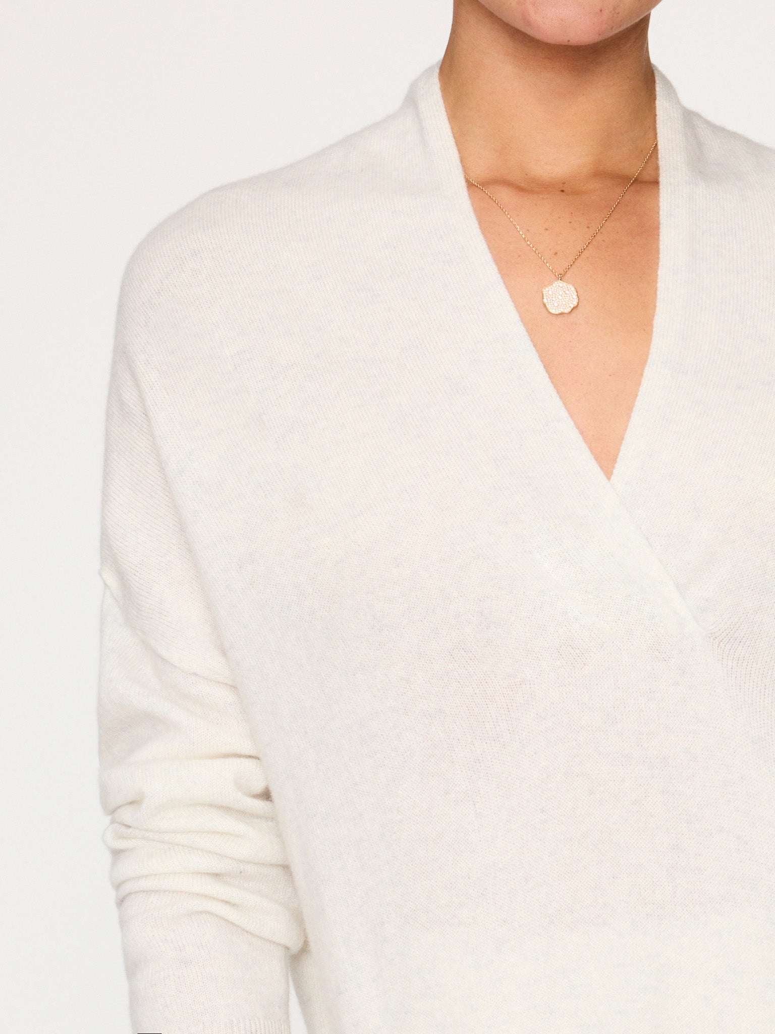 Siena v-neck pullover white sweater close up 