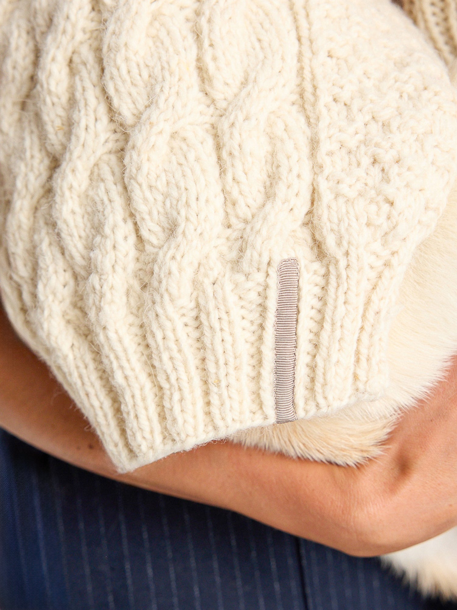 Cable knit neutral dog sweater back detail