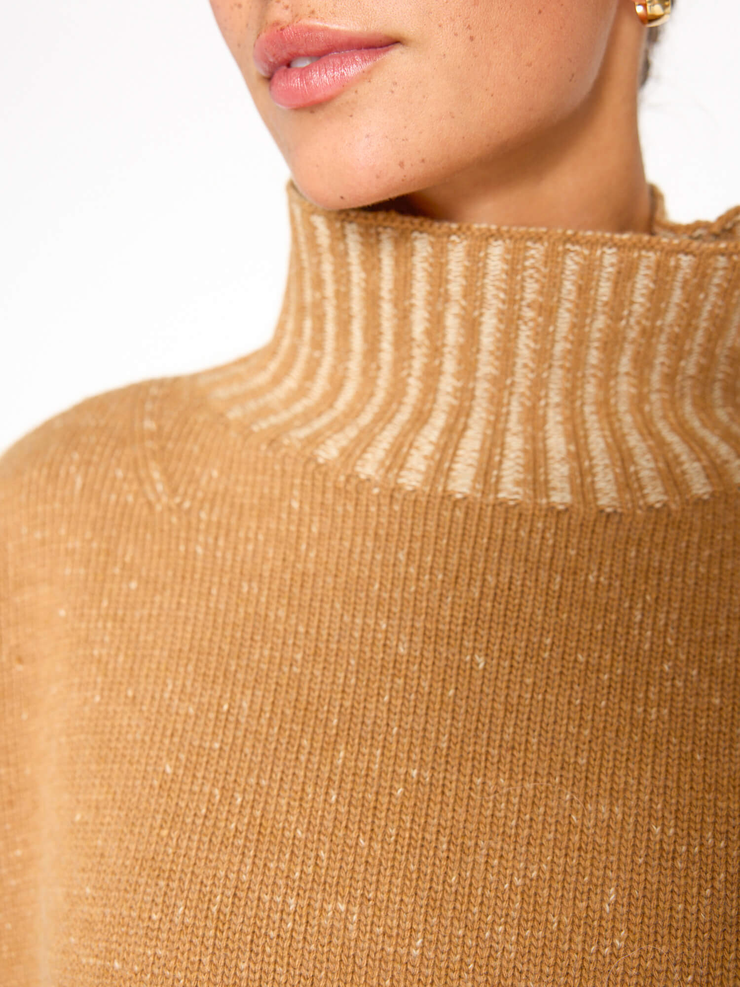 Ana tan turtleneck sweater close up