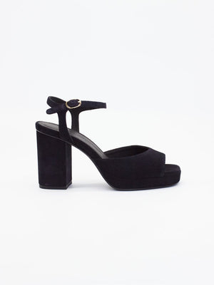 Black heels for women featuring a block heel, platform sole, and ankle strap with a gold buckle.