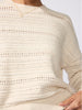 Close-up of the Everyday multi-stitch bright crew sweater in oatmeal melange, showing its open-knit texture