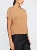 Women's sleeveless sweater in oatmeal beige with a soft drape, high neckline, and center seam detail down the back.