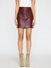 Womens vegan leather mini skirt in Barolo hue with center seam detail and saddle stitching