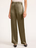 Close-up front view of olive green satin pants with a belted waistband and black flats