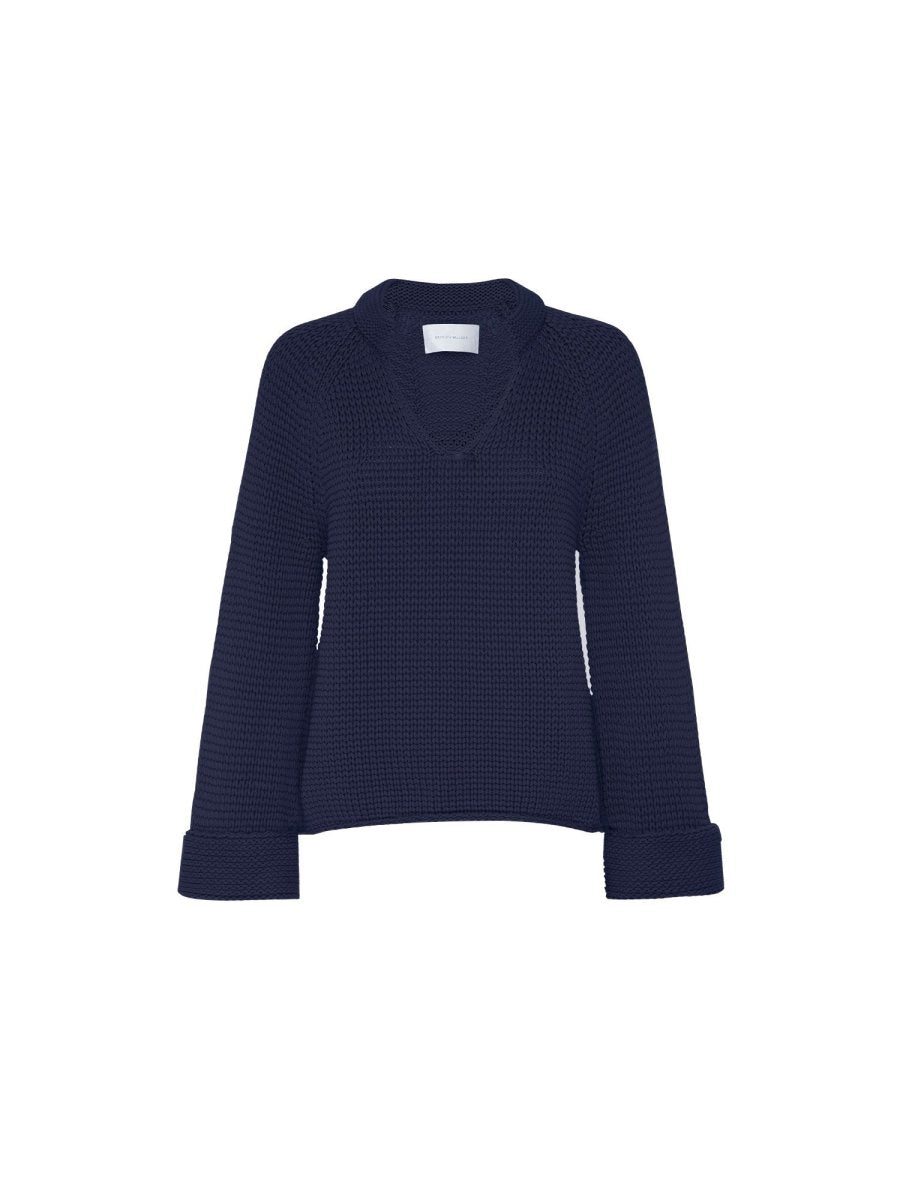 Womens navy sweater in solid navy knit with relaxed fit ribbed trim and hip length cut