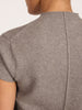 Close-up back view of the Emmy cotton-wool cardigan in otter melange, showing the short-sleeve knit texture.