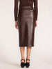 Vegan croco-embossed pencil skirt in carob, back view with a ribbed top and platform sandals