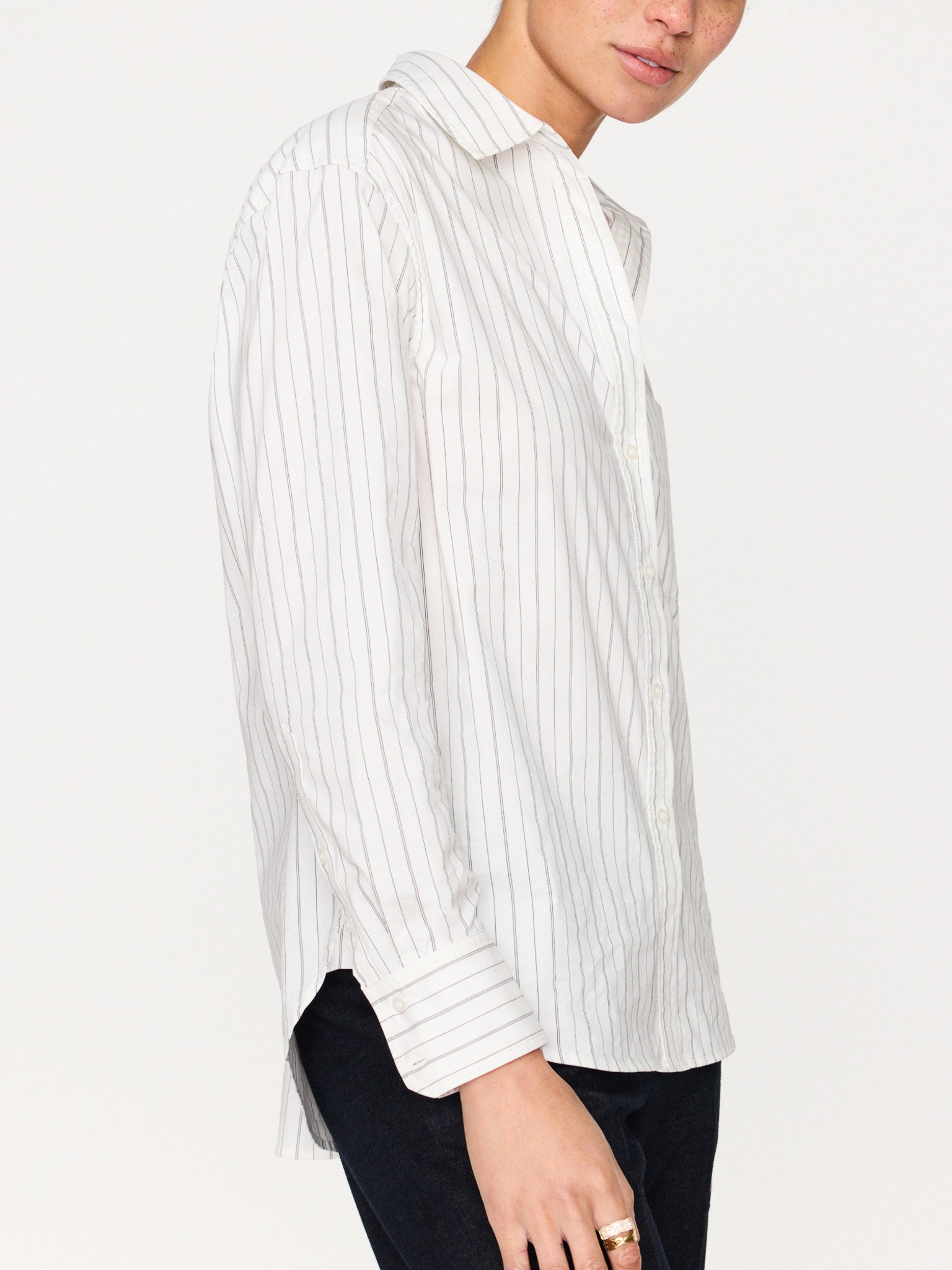 Everyday button up white stripe shirt side view