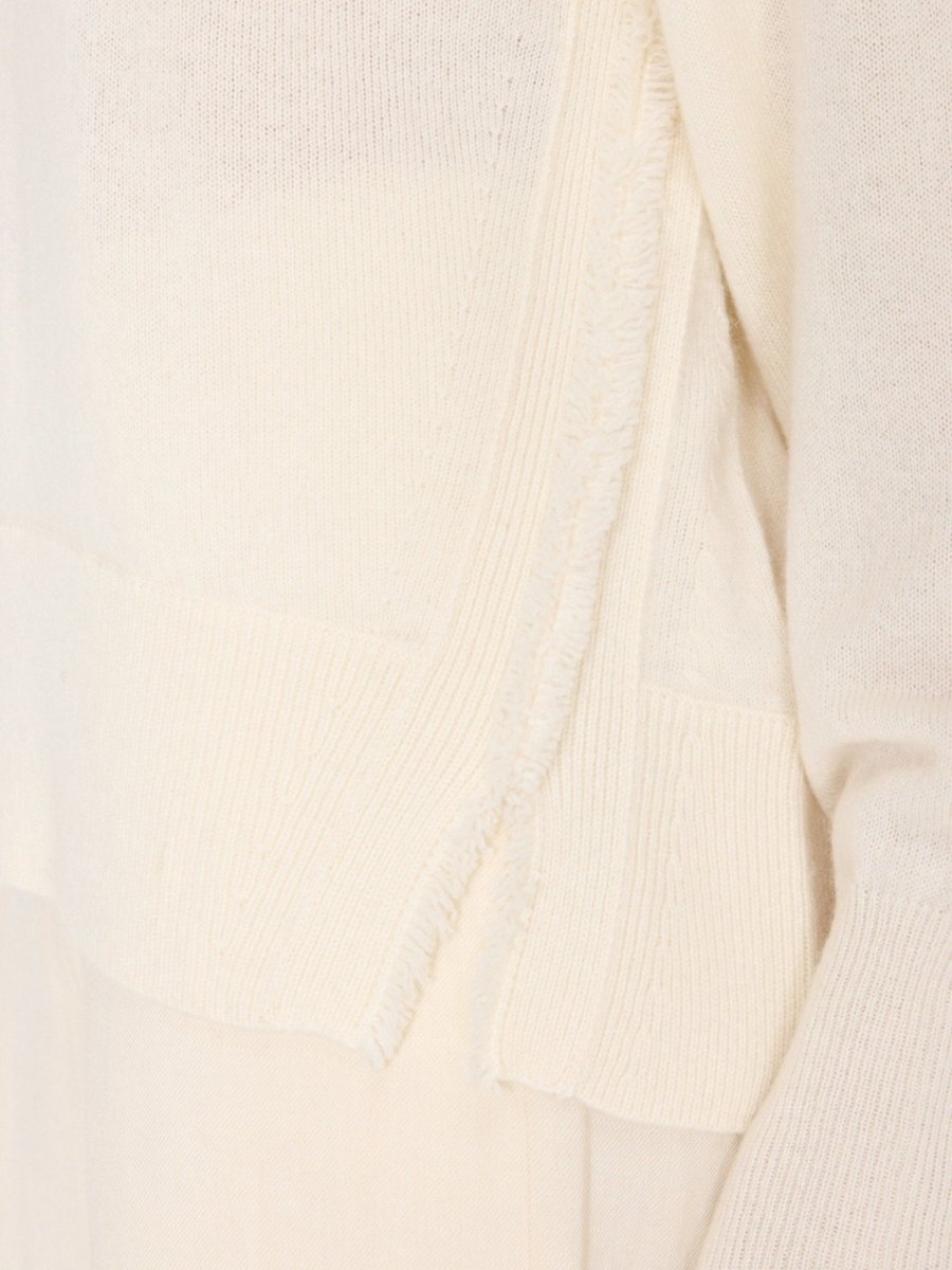 Fenton ivory crewneck fringe sweater side closeup view