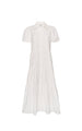 Flat lay of a classy white tiered midi shirtdress with puff sleeves and three-tiered skirt on a white background.