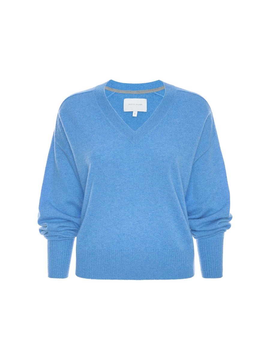 Blue classy sweater in a soft knit with a V-neckline, relaxed fit, and ribbed cuffs and hem shown as a flat lay.