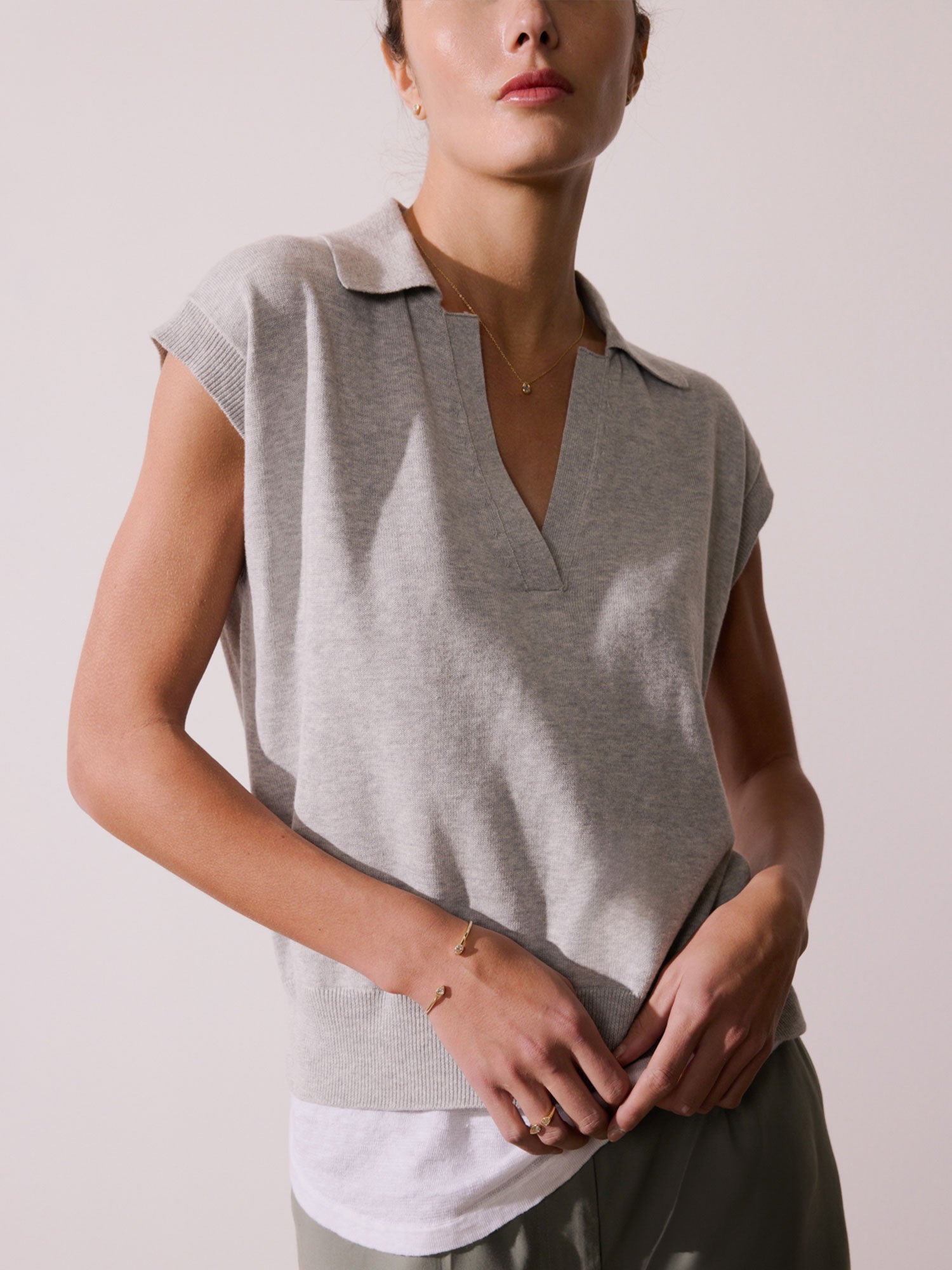 Jaia layered polo short sleeve grey sweater front view