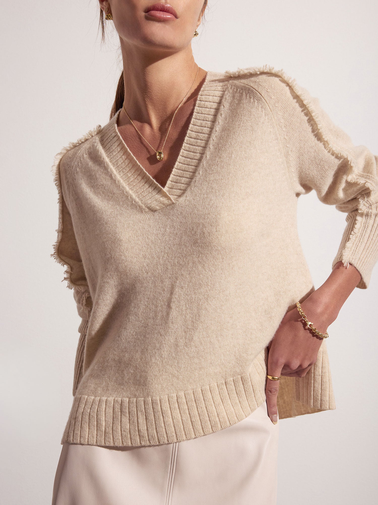 Jolie beige fringe trim v-neck sweater flat view front view