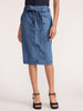 Women's denim skirt in light-wash with a self-tie front bow, high waist, pencil silhouette, and stitched hem shown front-facing with black heeled sandals.