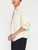 Kate V-neck button up beige shirt side view