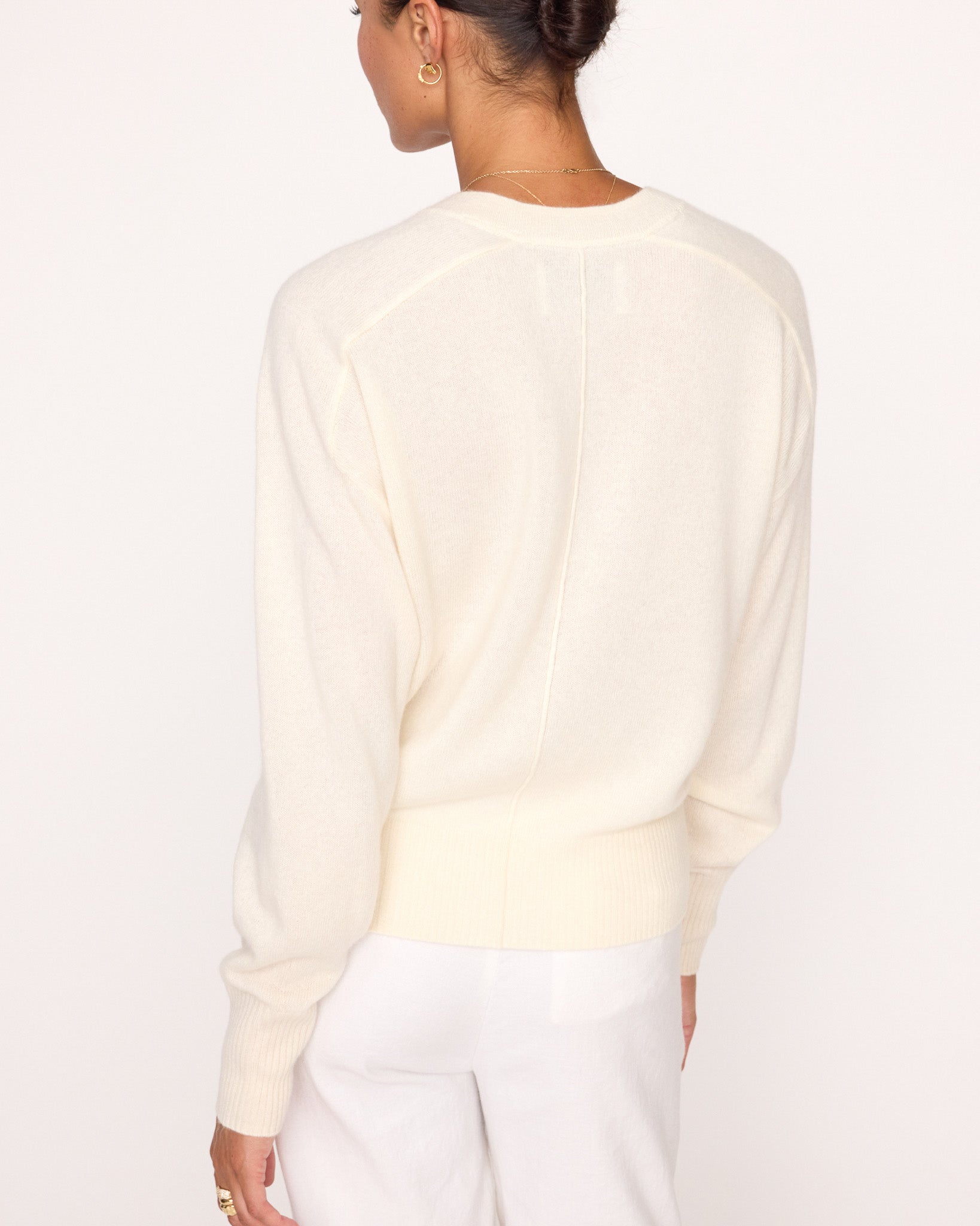 Leia V-neck beige sweater back view 