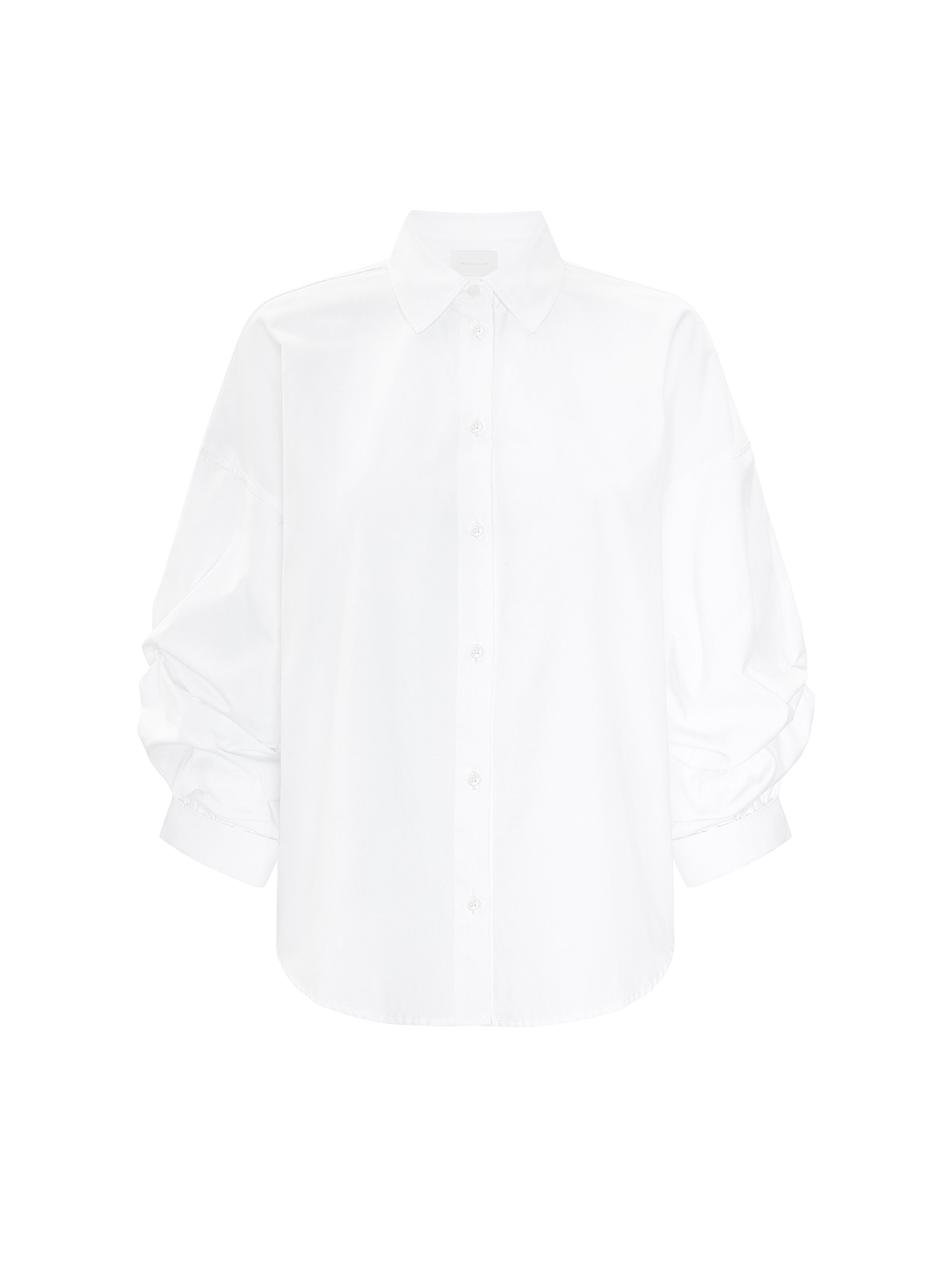Milan shirt in salt white, an oversized long-sleeve button-up with gathered cuffs, shown flat on a white background.