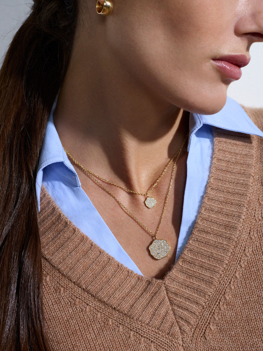 Arden tan with blue oxford layered v-neck sweater close up