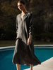 Voile kaftan dress in brownstone, three-quarter sleeve linen midi dress, poolside garden setting