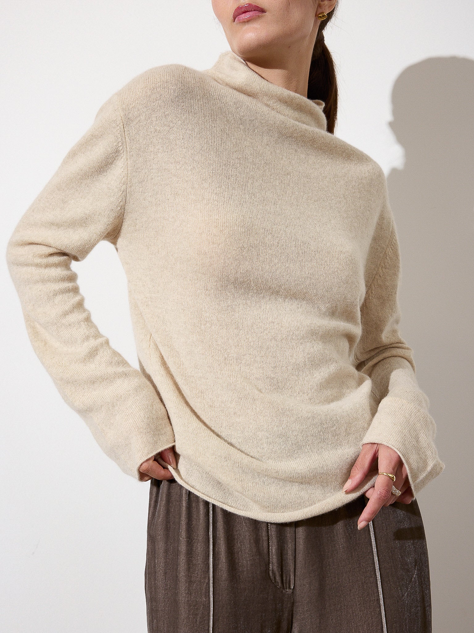 Rhone funnel neck beige sweater front view 