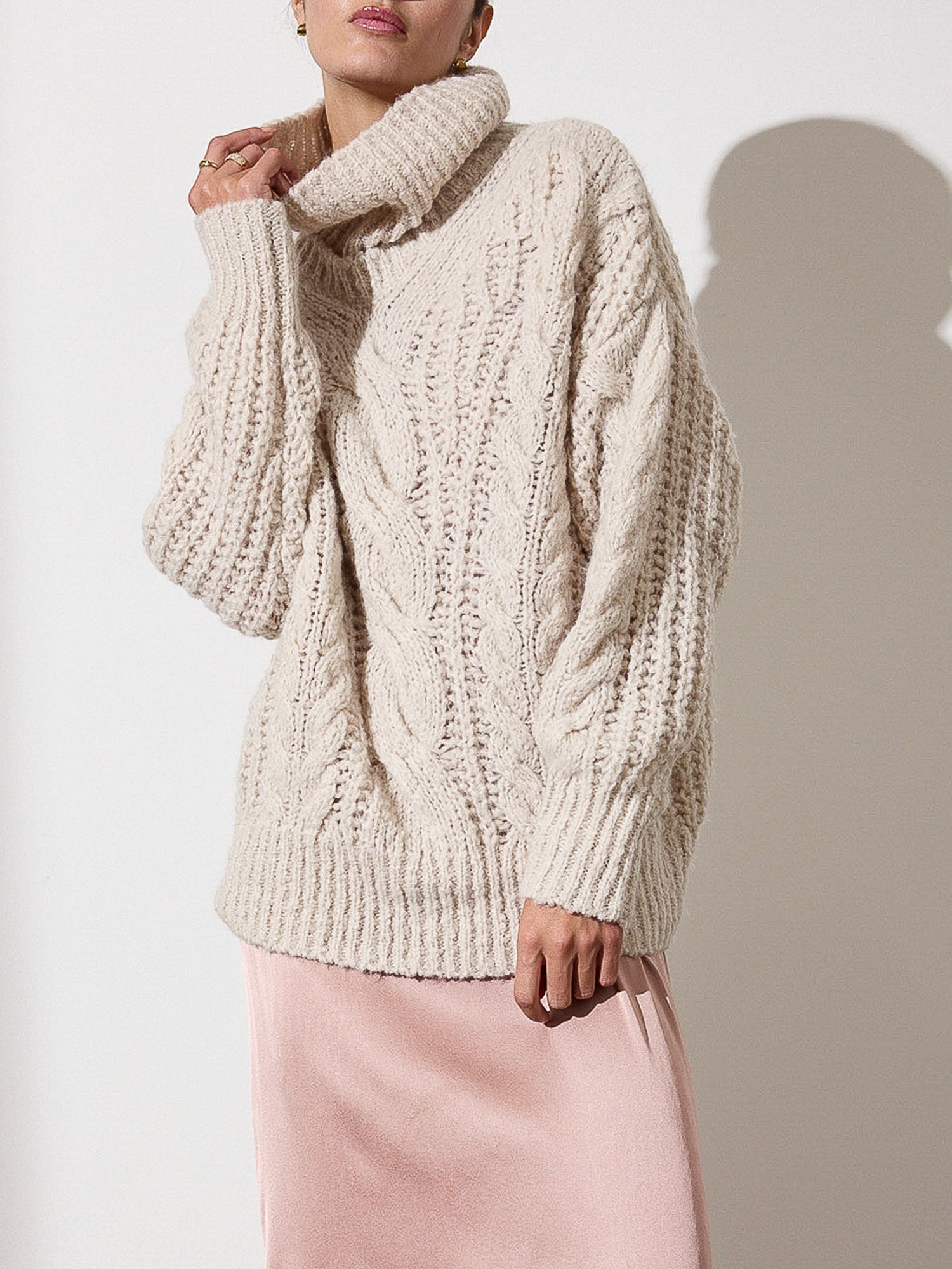Elden cable knit beige turtleneck sweater front view