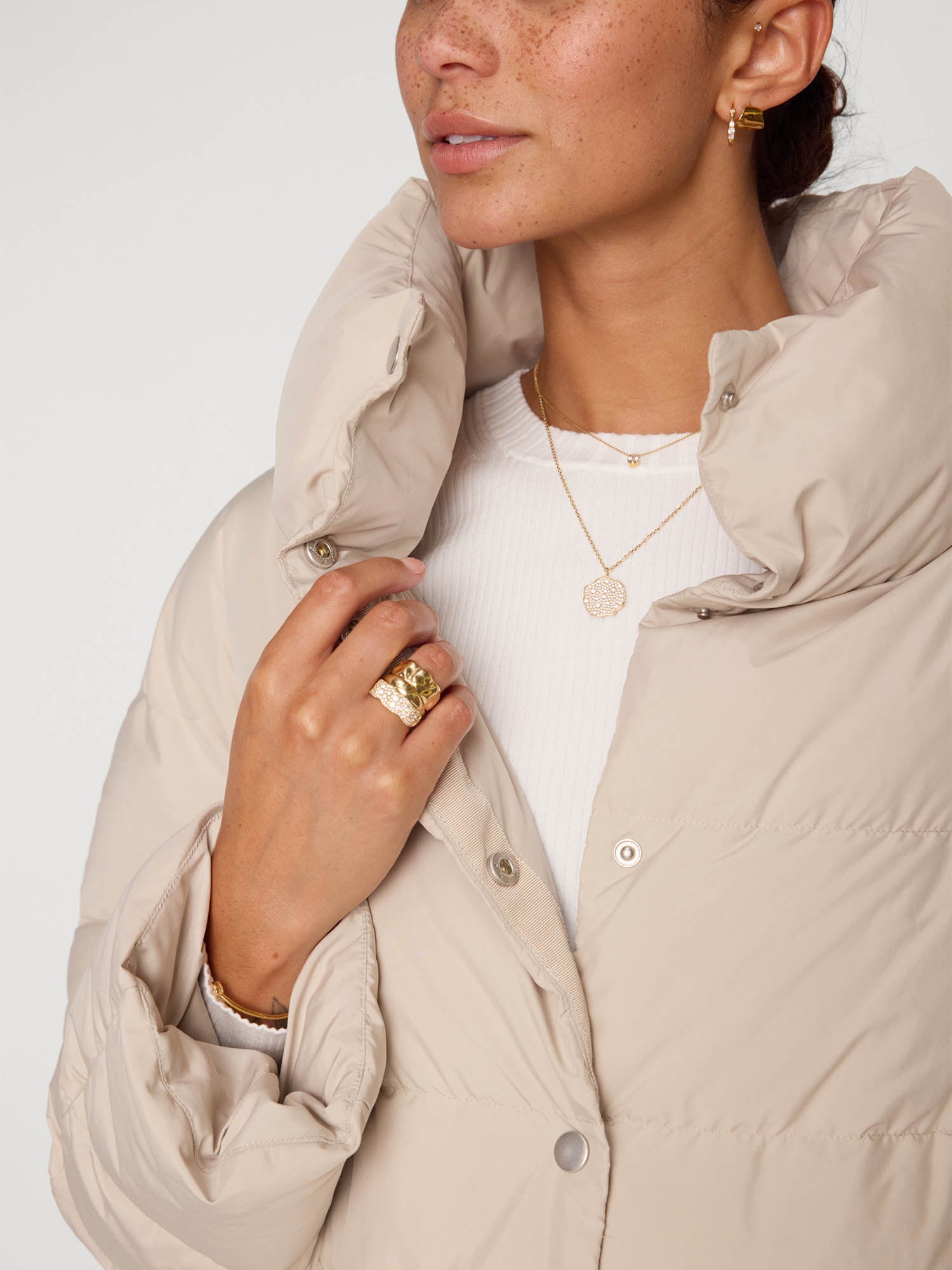 Vail nylon down beige puffer jacket close up