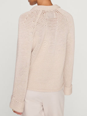 Aria stand collar deep v neckline beige sweater back view