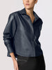 Cropped vegan leather shirt jacket in navy, close-up studio shot