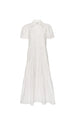 Flat lay of a classy white tiered midi shirtdress with puff sleeves and three-tiered skirt on a white background.