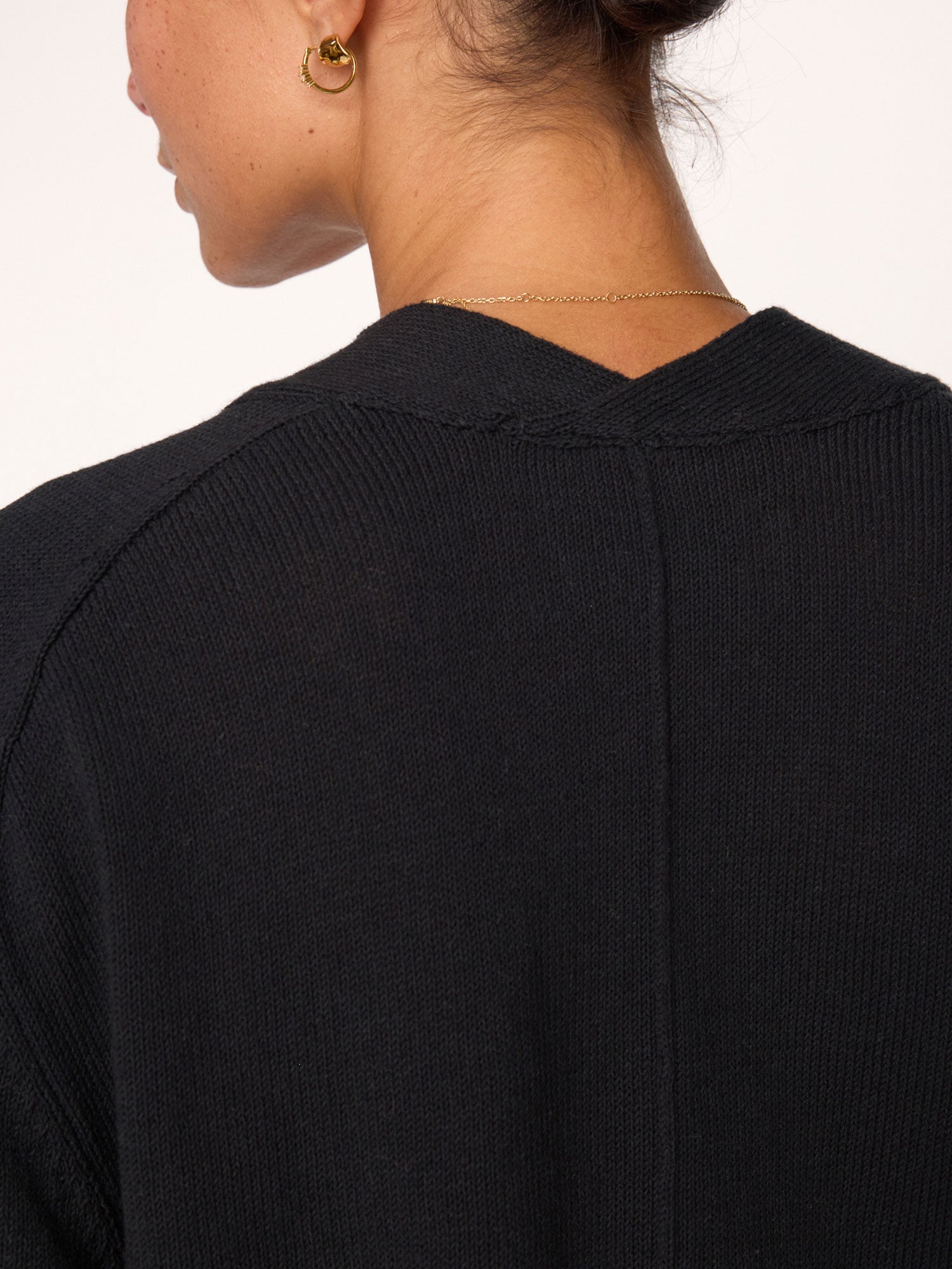 Imogen V-neck cotton black sweater close up