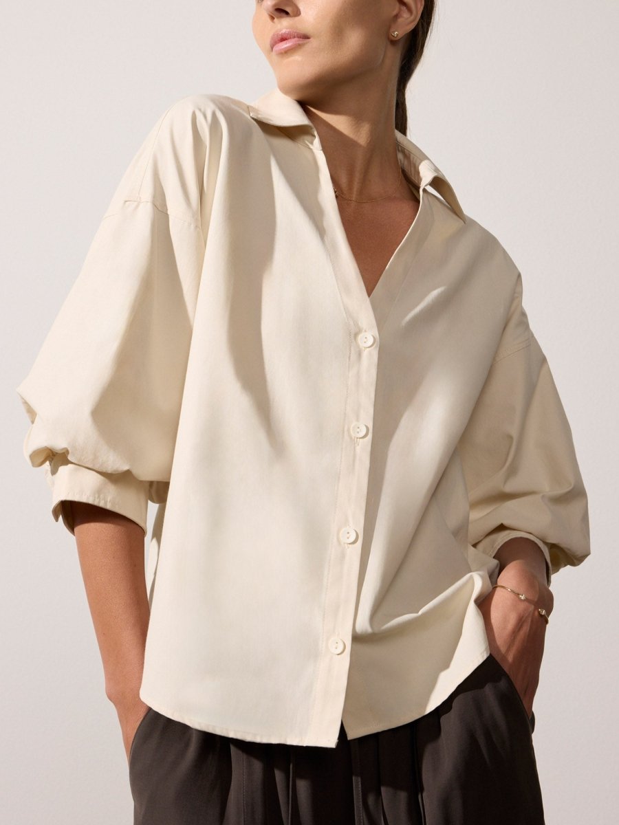 Kate V-neck button up beige shirt front view