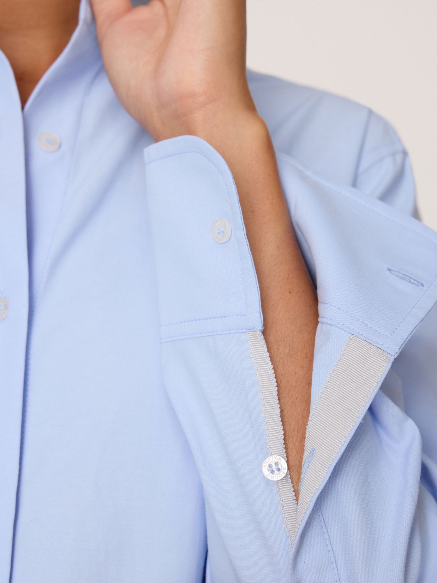 Lark button up light blue shirt close up
