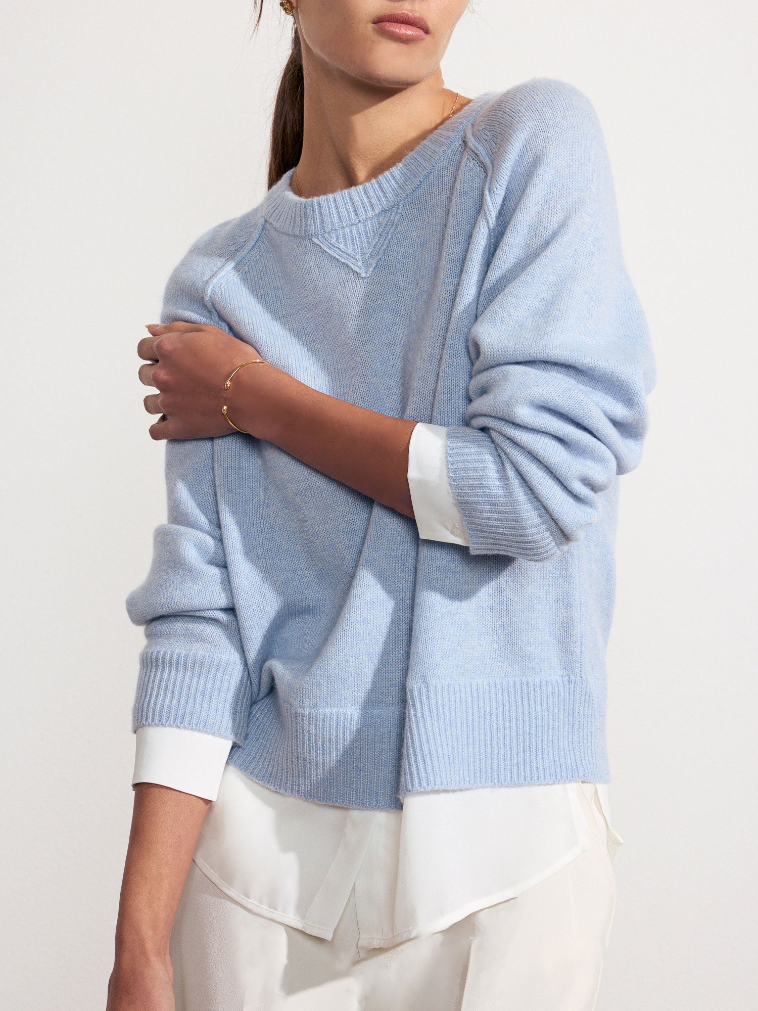 Looker Layered crewneck light blue sweater front view