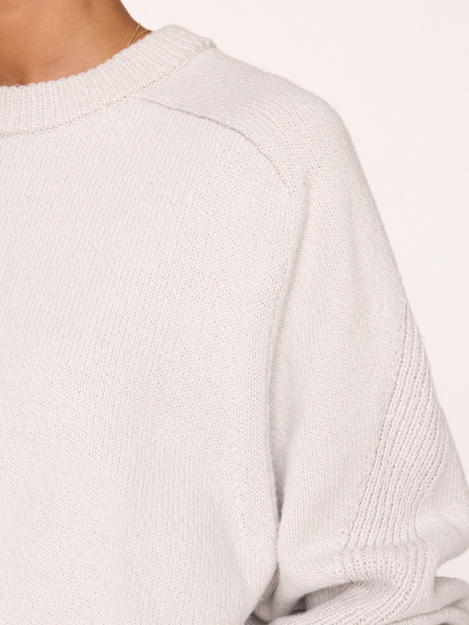 Pele grey crewneck sweater close up