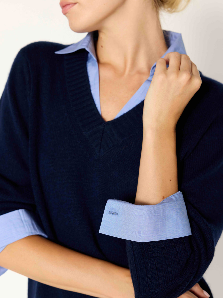 Arden navy blue oxford layered v-neck sweater close up