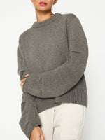 Elira grey curved sleeve crewneck sweater front view