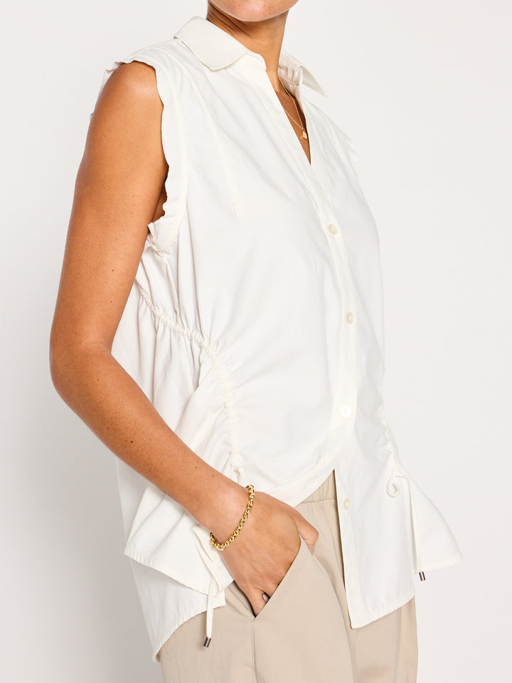 Marcie white sleeveless button up top side view