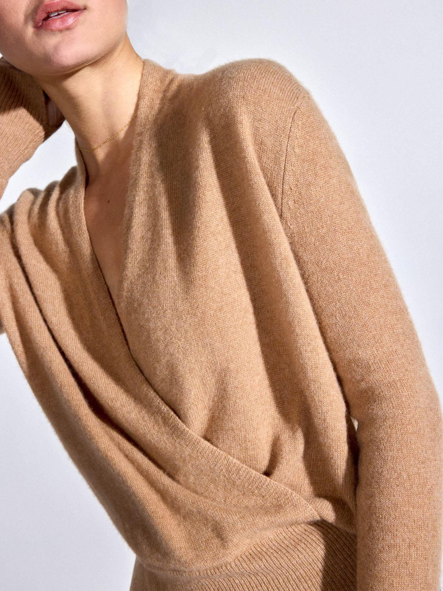 Phinneas cashmere v-neck blue tan sweater side view