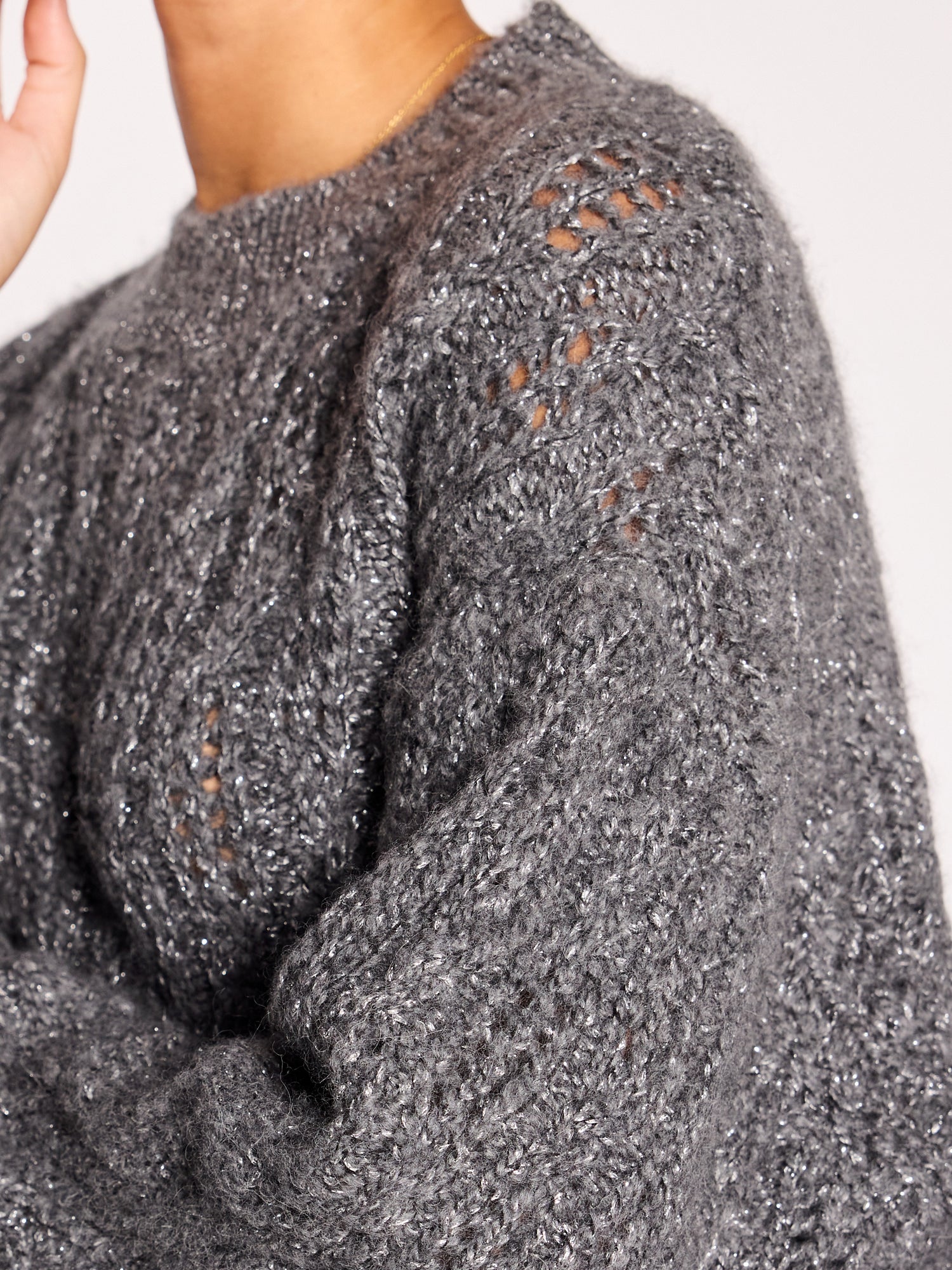 Restoin grey with metallic crewneck sweater close up