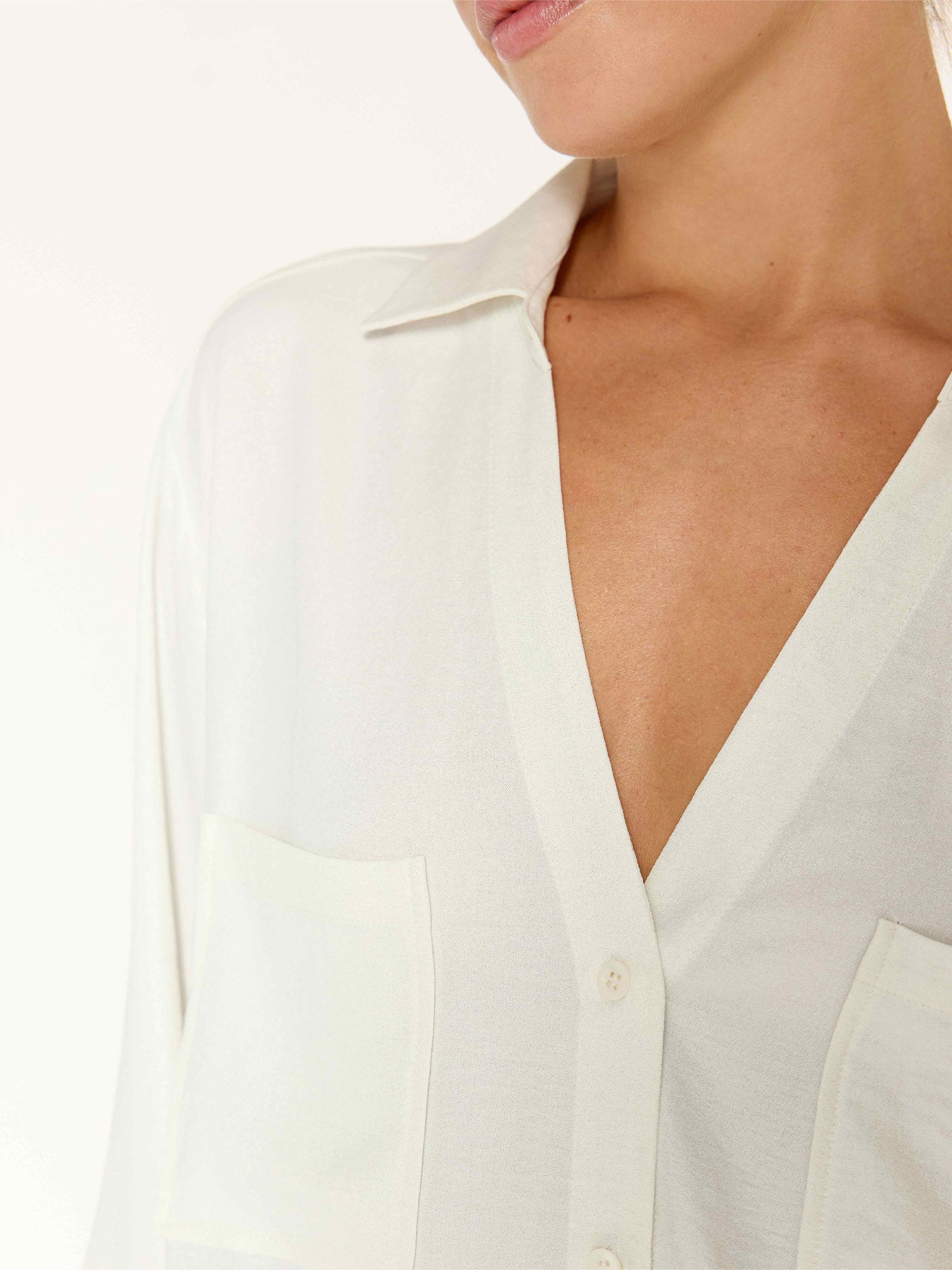 River button up white shirt close up