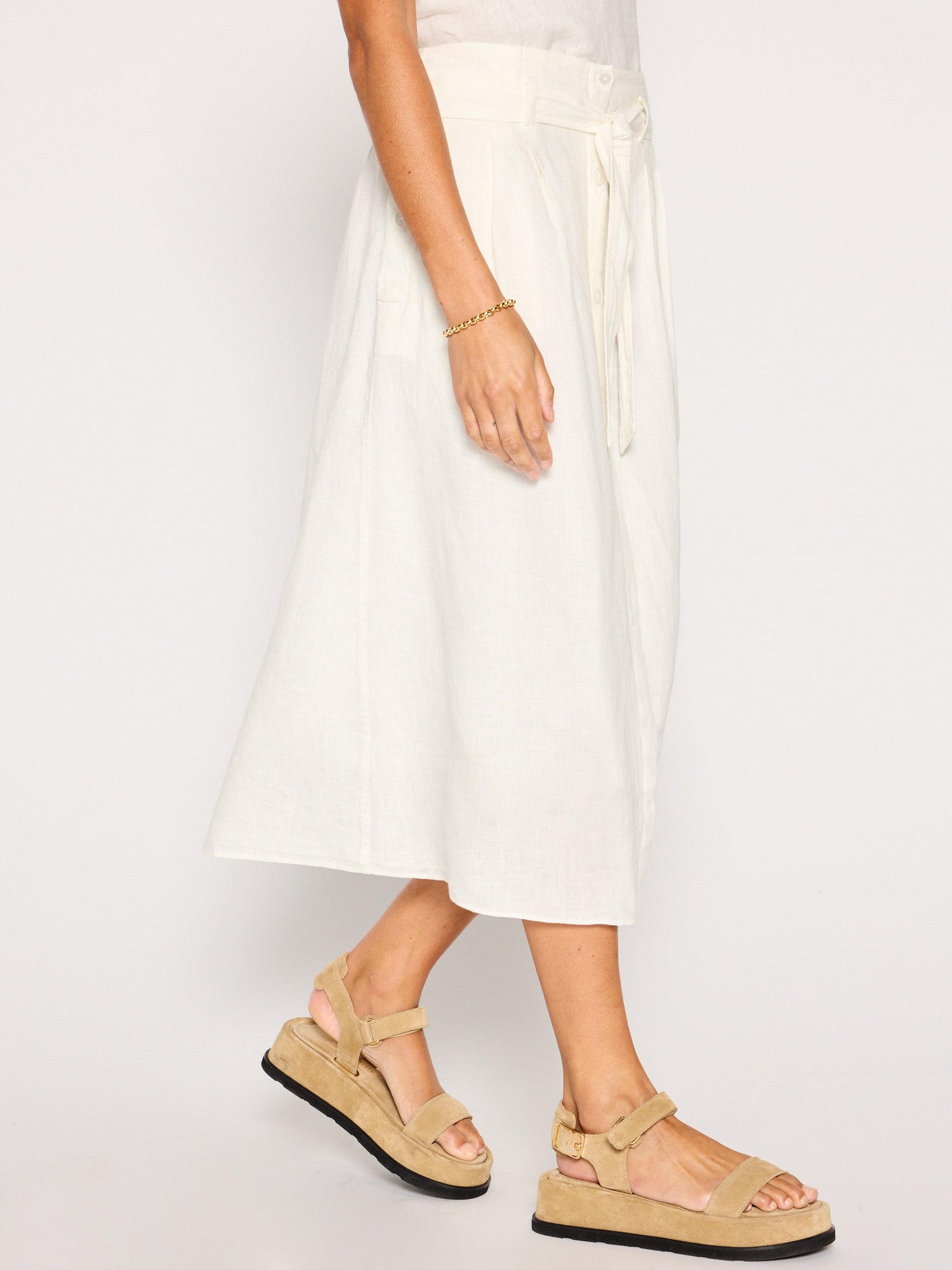 Teagan ivory belted button front midi skirt side view