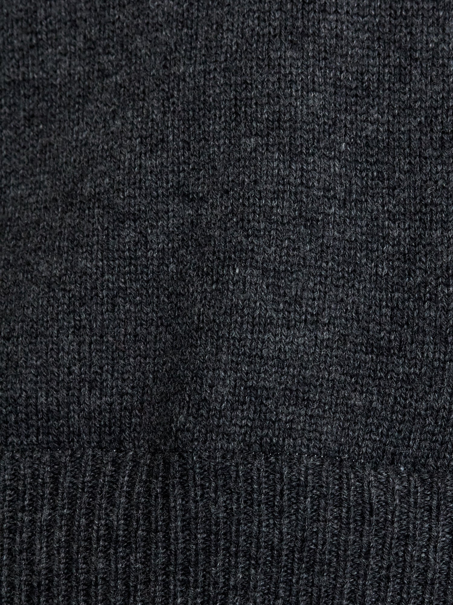 Looker dark grey layered v-neck sweater close up
