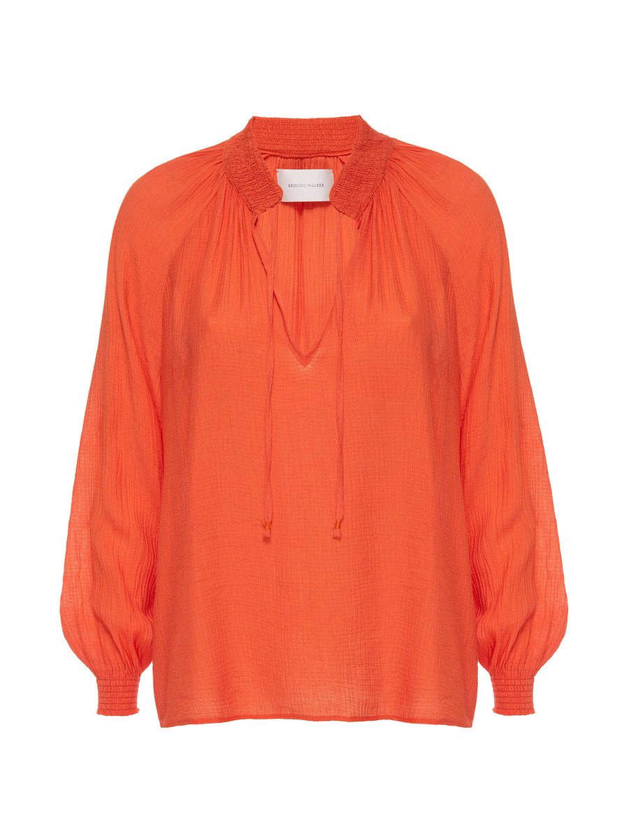 Amaia orange crepe popover blouse flat view