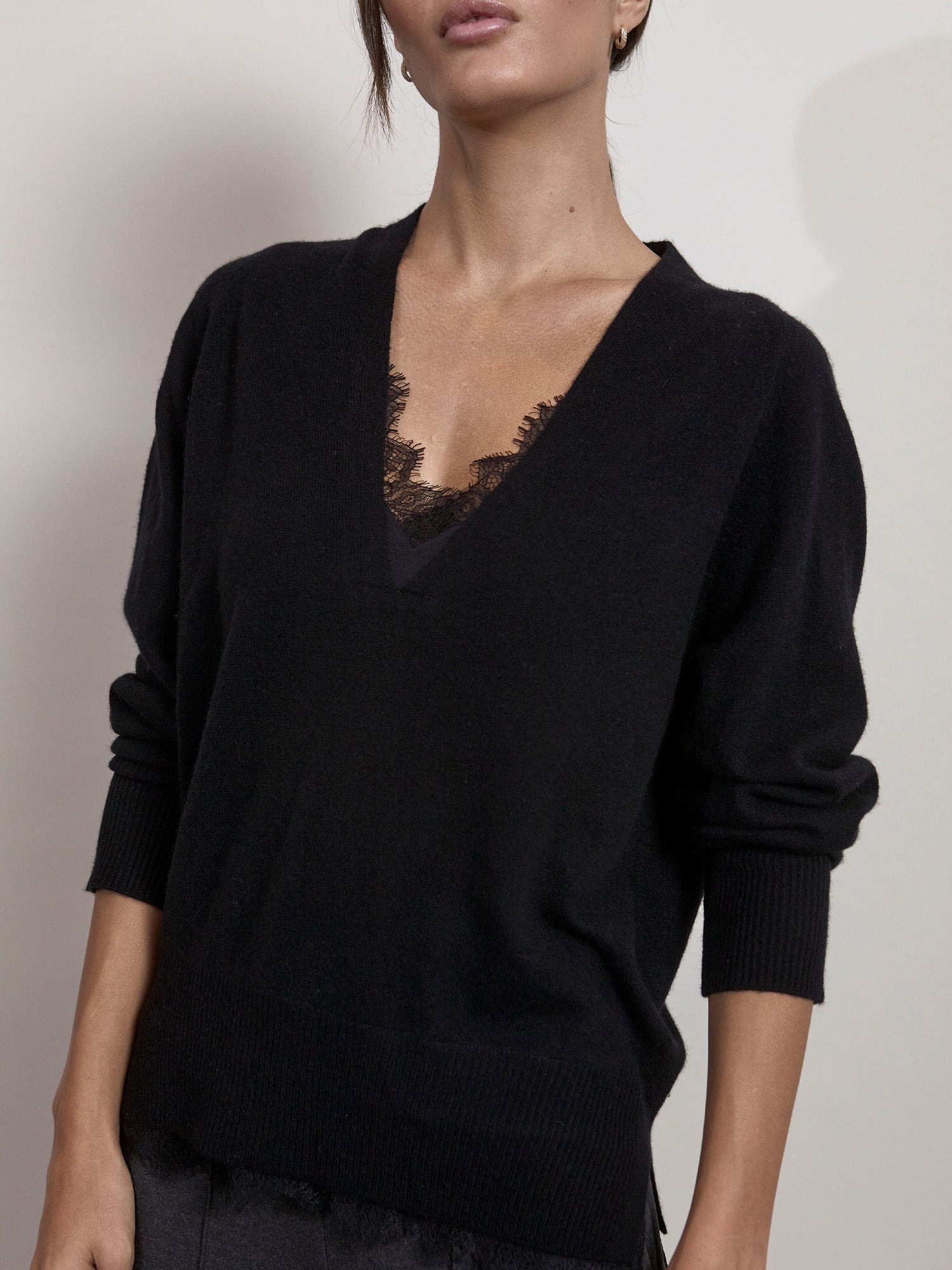 Black lace layered v-neck sweater front view
