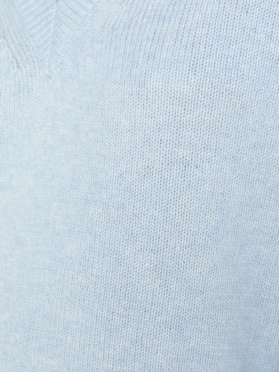 Looker light blue layered v-neck sweater close up 